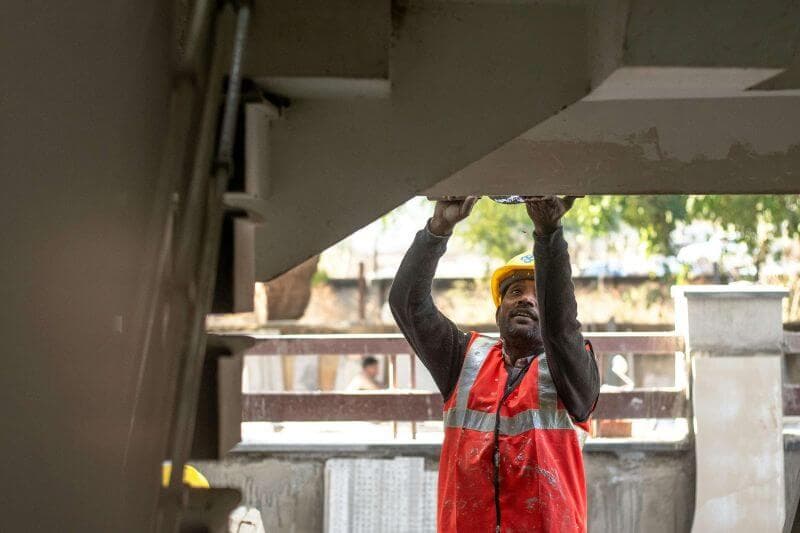 Construction worker on site wearing safety gear